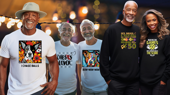 White t-shirt with playful graphic of a black and white heeler surrounded by colorful flowers and the words "I Chase Balls" underneath. White t-shirt with "Chess Lover" Another white t-shirt with a colorful American bully in a frame with the words "Bow-Wow-Wow" underneath. Two black sweatshirts the first a birthday theme and the second pickleball themed.