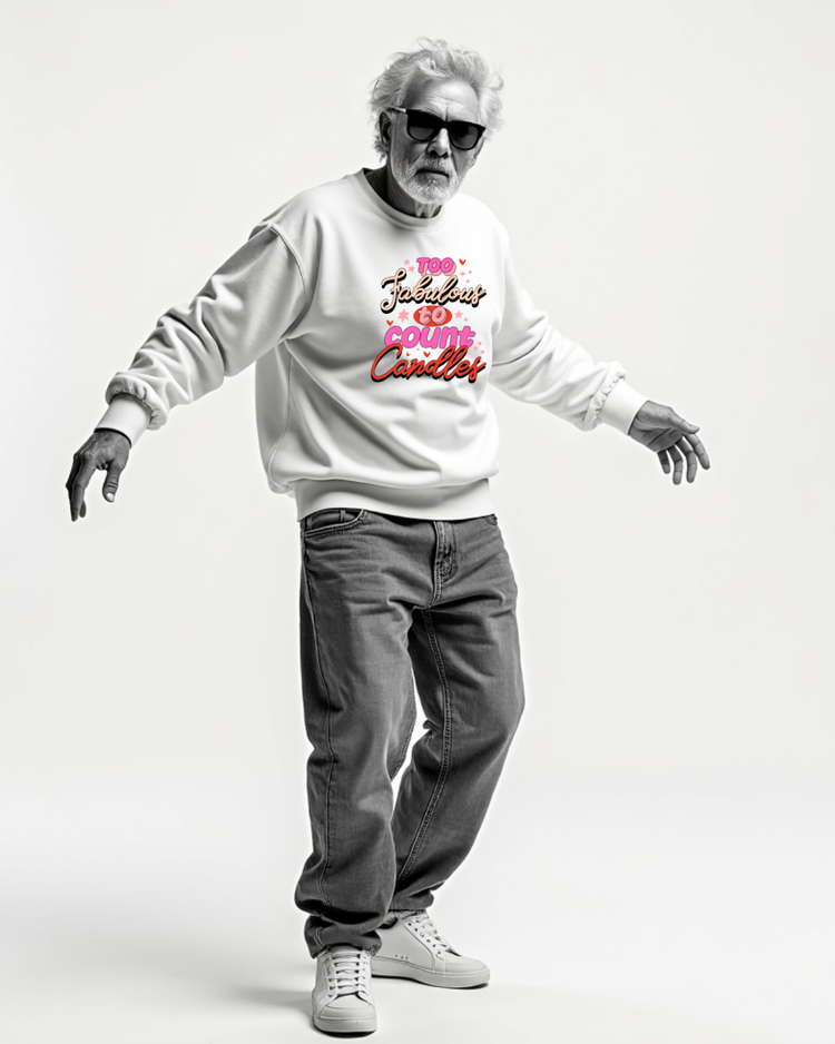 Person wearing a white sweatshirt with colorful text reading Too Fabulous for candles on a white background