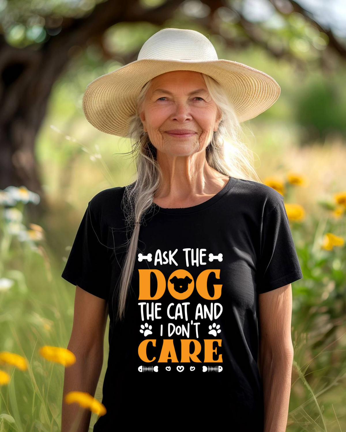 Woman wearing black t-shirt with "Ask the Dog the cat and I don&