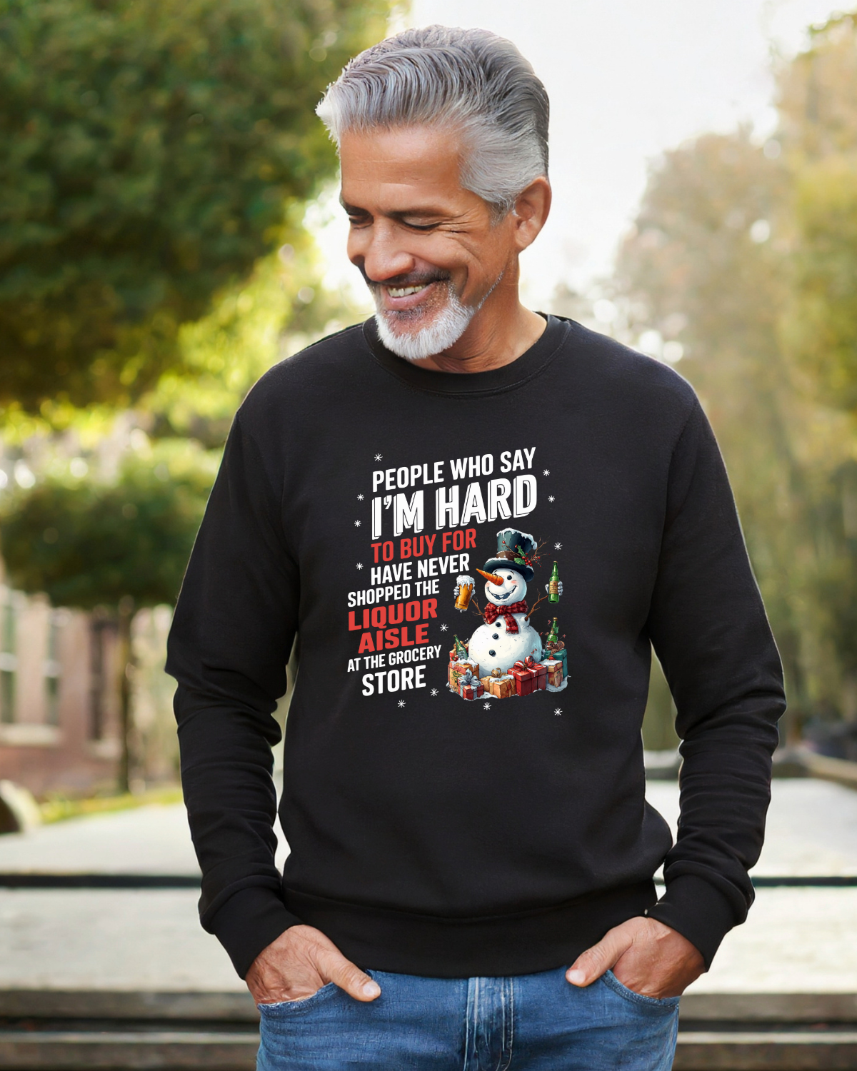 Man wearing black sweatshirt with snowman graphic "People who say I&