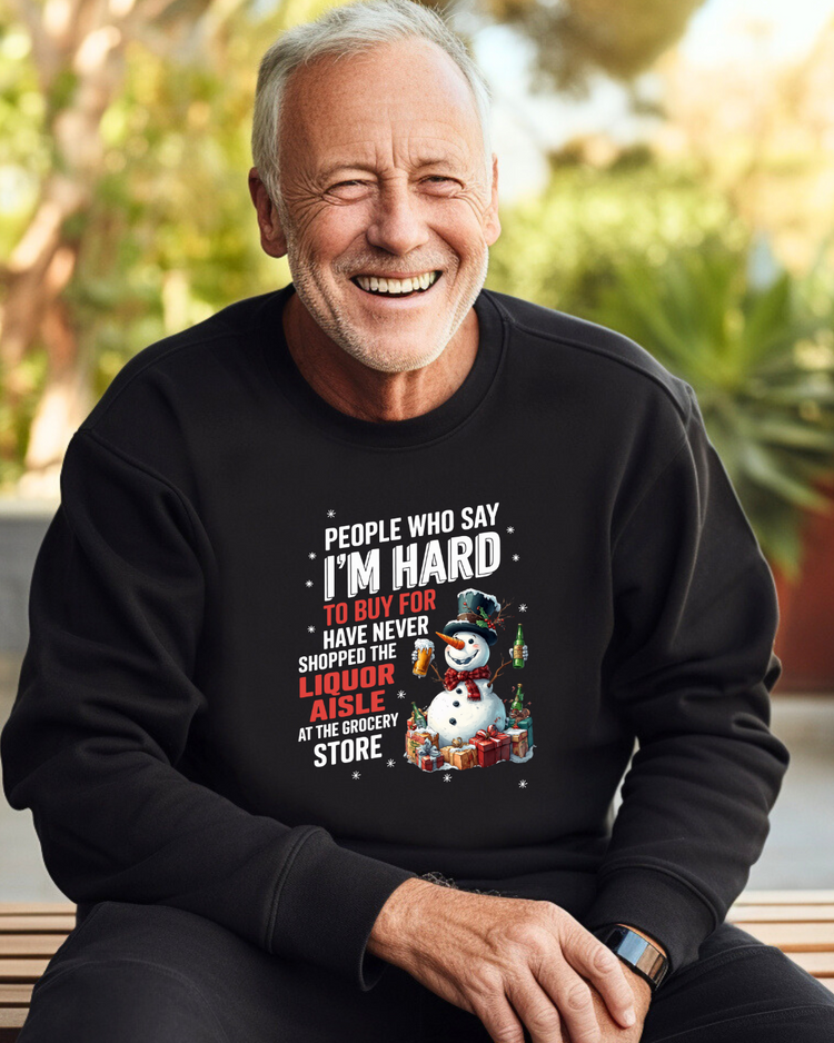 Smiling man wearing funny t-shirt with snowman and text "People who say I&