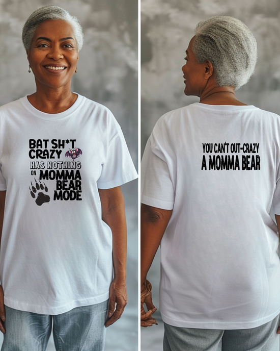 White t-shirt with humorous text design reading "bat sh*t crazy has nothing on Momma bear mode" worn by a person, shown front and back.