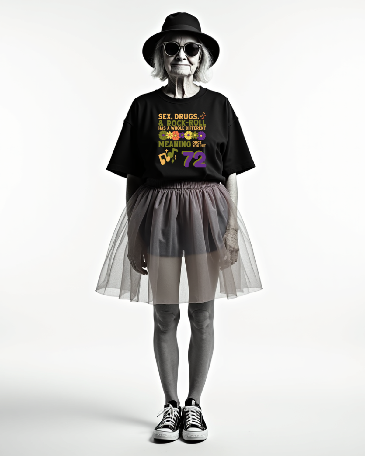 Person wearing a personalizable black t-shirt with colorful text, gray tulle skirt, and black shoes on a white background