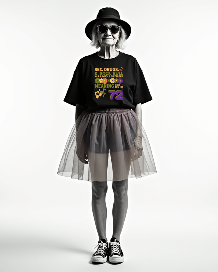 Person wearing a personalizable black t-shirt with colorful text, gray tulle skirt, and black shoes on a white background