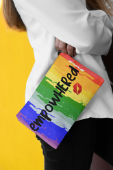 Person holding a rainbow-colored pouch with &