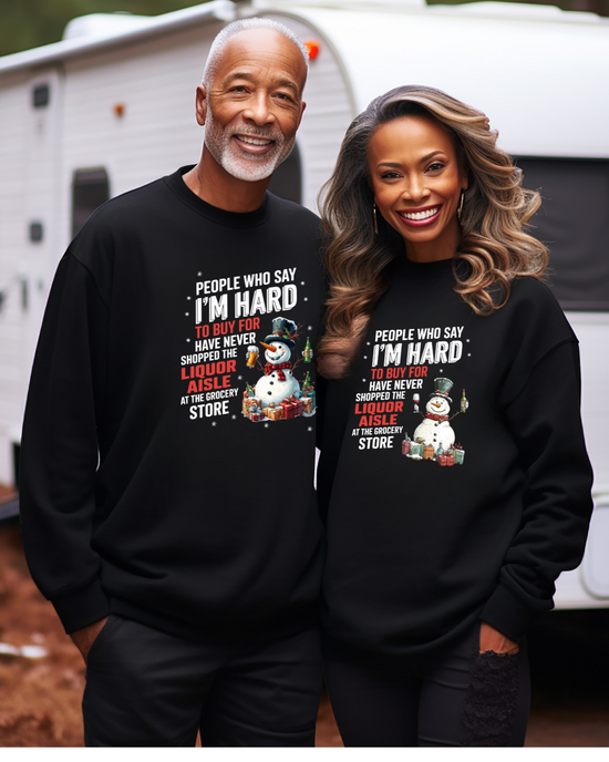 Man and woman wearing black sweatshirts featuring the words "People who say I'm hard to shop for Haven't shopped the liquor isle at the grocery store."