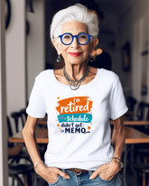 Woman wearing a white t-shirt with a humorous standing in a casual setting.