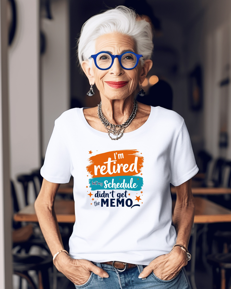 Woman wearing a white t-shirt with a humorous standing in a casual setting.