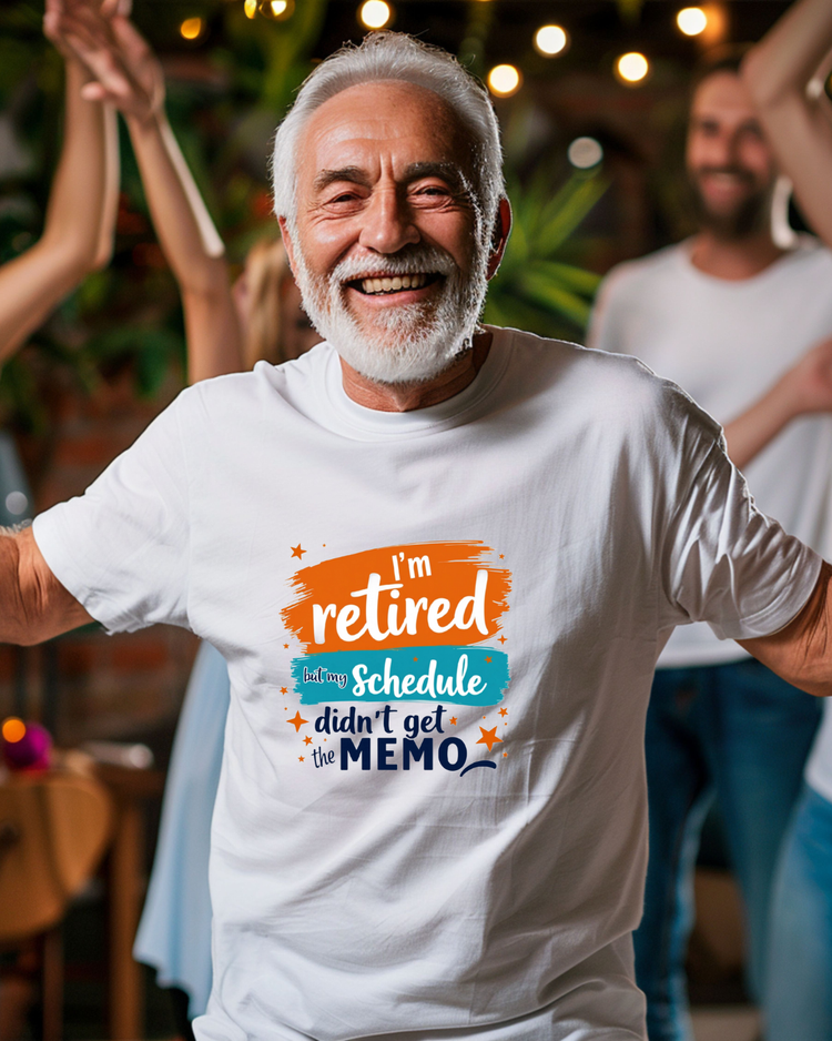 Man wearing a white t-shirt with a humorous retirement message in a social setting.
