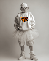 Person wearing a white sweatshirt with &